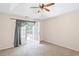 Comfortable bedroom with access to a private deck through glass doors at 4038 Sharon Woods Dr, Powder Springs, GA 30127
