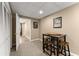 Basement area featuring a small table with four stools and an entryway at 4955 Winding Rose Dr, Suwanee, GA 30024