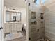 Bathroom with a walk-in shower, soaking tub, granite counters, and double sinks at 4955 Winding Rose Dr, Suwanee, GA 30024