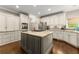 Beautiful kitchen featuring white cabinets, granite countertops, and stainless steel appliances at 4955 Winding Rose Dr, Suwanee, GA 30024