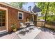 Private backyard deck featuring an outdoor seating area, perfect for relaxing at 1055 Woodland Se Ave, Atlanta, GA 30316