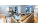 Cozy living room with hardwood floors, and an open concept layout to the dining area at 1055 Woodland Se Ave, Atlanta, GA 30316