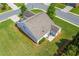 Aerial view of home displaying expansive lawn, patio, and exterior architecture at 2920 Farmstead Way, Suwanee, GA 30024