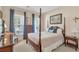 Comfortable bedroom with 4 poster bed and lots of natural light at 2920 Farmstead Way, Suwanee, GA 30024