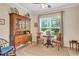 Cozy dining room with natural light and seating for two at 2920 Farmstead Way, Suwanee, GA 30024