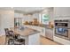 Well-equipped kitchen with a large island, stainless steel appliances, and white cabinets at 2920 Farmstead Way, Suwanee, GA 30024