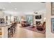 Open-concept living room with a fireplace and seamless flow to the kitchen at 2920 Farmstead Way, Suwanee, GA 30024