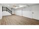 Finished basement featuring wood-look floors and plenty of open space at 5115 Leland Dr, Stone Mountain, GA 30083