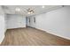 Open basement area featuring wood-look floors and natural light coming through the window at 5115 Leland Dr, Stone Mountain, GA 30083