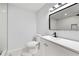 Modern bathroom featuring a stylish vanity, geometric floor tiles, and updated fixtures at 5115 Leland Dr, Stone Mountain, GA 30083