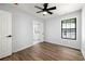Comfortable bedroom with a view into the ensuite bathroom and a large window for natural light at 5115 Leland Dr, Stone Mountain, GA 30083