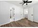 Spacious bedroom with ceiling fan and ample closet space is perfect for relaxation at 5115 Leland Dr, Stone Mountain, GA 30083