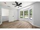 Cozy bedroom with bay window and closet space, bathed in sunlight for a warm ambiance at 5115 Leland Dr, Stone Mountain, GA 30083