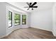 Bright bedroom with large windows and ceiling fan provides natural light and comfort at 5115 Leland Dr, Stone Mountain, GA 30083