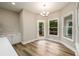 Cozy breakfast nook with deck access, natural light, and built in cabinetry at 620 Reeves Hill Pt, Lawrenceville, GA 30043