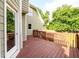 Angle view of the expansive wood deck off the main floor of the house at 620 Reeves Hill Pt, Lawrenceville, GA 30043