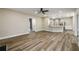 Spacious living room featuring hardwood floors and an open layout connecting to the kitchen at 620 Reeves Hill Pt, Lawrenceville, GA 30043