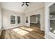 Inviting sunroom boasts lots of natural light and vaulted ceilings at 620 Reeves Hill Pt, Lawrenceville, GA 30043
