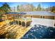 Aerial view of the back of the house with a deck area overlooking a very large lot at 681 Fielding Sw Ln, Atlanta, GA 30311