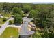 An aerial view of the home and a large, wooded backyard with a covered parking space at 681 Fielding Sw Ln, Atlanta, GA 30311