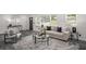 Well-lit living room with comfortable seating, stylish accents, and a calming ambiance at 681 Fielding Sw Ln, Atlanta, GA 30311