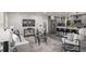 Bright and airy living room with a seamless layout connecting to an eat-in kitchen at 681 Fielding Sw Ln, Atlanta, GA 30311