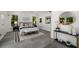 Serene main bedroom with modern decor, natural light, and access to a balcony with views at 681 Fielding Sw Ln, Atlanta, GA 30311