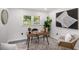 Cozy home office with a stylish desk, comfortable seating, and natural light from the window at 681 Fielding Sw Ln, Atlanta, GA 30311
