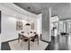 Light filled dining area featuring concrete accents, modern table with seating for six, and contemporary lighting at 860 Peachtree Ne St # 1502, Atlanta, GA 30308