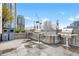 The convenient outdoor grilling area is equipped with multiple grills and waste stations for effortless entertaining at 860 Peachtree Ne St # 1502, Atlanta, GA 30308