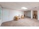 Basement featuring cozy seating and ample open space, perfect for relaxation at 1737 Mount Berry Dr, Douglasville, GA 30135