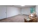 Basement featuring cozy seating and ample open space, perfect for relaxation at 1737 Mount Berry Dr, Douglasville, GA 30135