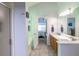 Bathroom with dual sinks and a connecting door to the main bedroom at 1737 Mount Berry Dr, Douglasville, GA 30135