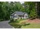 Charming single-Gathering home with manicured lawn and mature trees, offering a peaceful setting at 1737 Mount Berry Dr, Douglasville, GA 30135