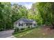 Attractive home featuring a well-kept yard, lush greenery, and inviting curb appeal at 1737 Mount Berry Dr, Douglasville, GA 30135