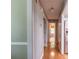 Hallway with wooden floors that connects the living areas and bedroom at 1737 Mount Berry Dr, Douglasville, GA 30135