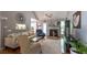 Bright living room featuring vaulted ceilings, a cozy fireplace, and stylish décor at 1737 Mount Berry Dr, Douglasville, GA 30135
