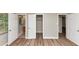 The room showcasing hardwood floors and multiple white doors at 3170 Bellgreen Way, Decatur, GA 30032