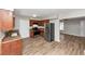 Bright kitchen with stainless steel refrigerator and wood cabinets at 3170 Bellgreen Way, Decatur, GA 30032