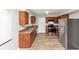 Modern kitchen featuring stainless steel appliances and hardwood floors at 3170 Bellgreen Way, Decatur, GA 30032