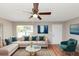 Stylish living room with comfortable seating, new hardwood floors, and modern décor at 3170 Bellgreen Way, Decatur, GA 30032