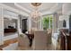 Dining room with a round table, chandelier, and view to the outside at 4250 Old Oak Trce, Cumming, GA 30041