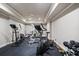Home gym with weights, treadmill, elliptical and multi-station equipment at 4250 Old Oak Trce, Cumming, GA 30041
