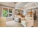 Spacious main bedroom features large windows, sitting area, trey ceilings and hardwood floors at 4250 Old Oak Trce, Cumming, GA 30041