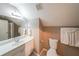 Well-lit bathroom features a single vanity and a shower with glass doors at 1382 Fountain Lakes Drive Dr, Lawrenceville, GA 30043