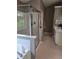 Bathroom boasts a large shower, white tiled floors, and a sleek vanity at 1382 Fountain Lakes Drive Dr, Lawrenceville, GA 30043