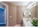Bathroom with white vanity, framed mirror, and neutral walls at 1382 Fountain Lakes Drive Dr, Lawrenceville, GA 30043
