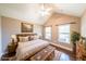 Staged bedroom featuring vaulted ceilings, hardwood floors, and natural light at 1382 Fountain Lakes Drive Dr, Lawrenceville, GA 30043