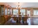 Dining room featuring hardwood floors, natural light, and elegant chandelier at 1382 Fountain Lakes Drive Dr, Lawrenceville, GA 30043