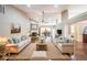 Spacious living room featuring hardwood floors, fireplace, and ample seating, perfect for entertaining guests or relaxing with Gathering at 1382 Fountain Lakes Drive Dr, Lawrenceville, GA 30043
